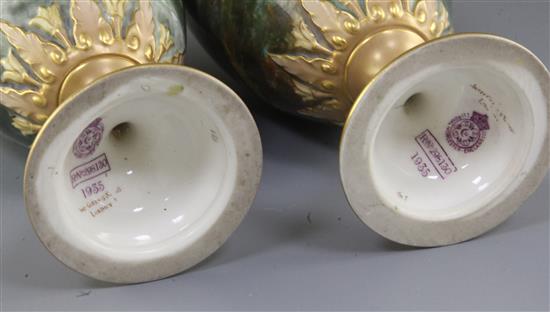 Harry Davis for Royal Worcester. A rare pair of Summer and Winter vases, height 33.5cm